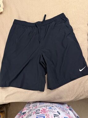 Nike Men's black Athletic Shorts with White Swoosh